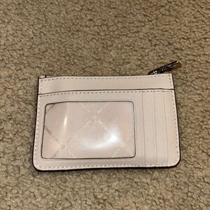 Small size Michael Kors wallet.  Like new